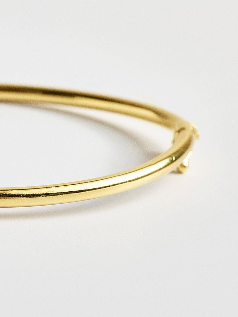 bracelete dourado articulado